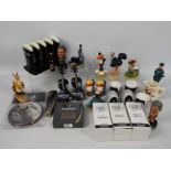 Guinness - A quantity of Guinness branded collectables to include cruet sets, egg cups, toast rack,