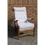 A good quality upholstered open armchair.