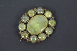 An antique yellow chalcedony brooch, 4 c