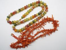 A rough coral bead necklace with yellow