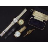 A small collection of wrist watches to i