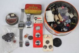 A mixed lot to include watches, buttons, badges and other.