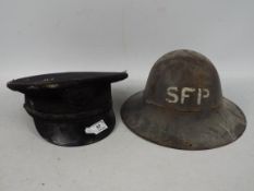 A Zuckerman type helmet and a peaked cap.