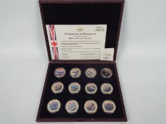 A limited edition, Windsor Mint, 24ct gold plated coin with colour image,