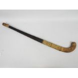 A vintage Springbok New Model hockey stick c.