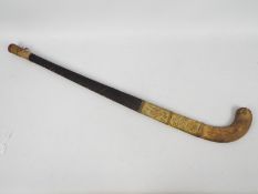 A vintage Springbok New Model hockey stick c.