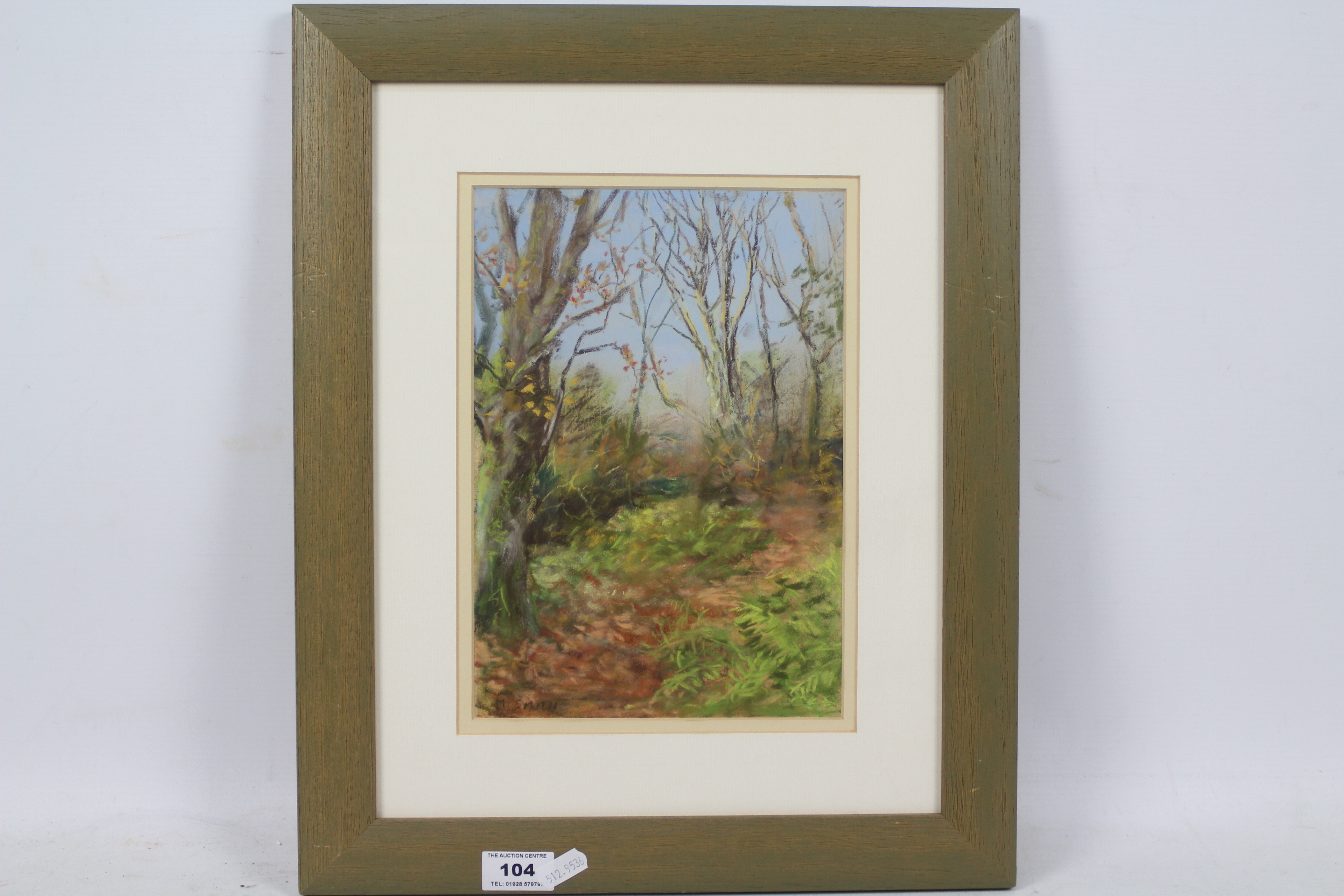 Michael Smith - A framed oil depicting a woodland landscape, signed lower left,