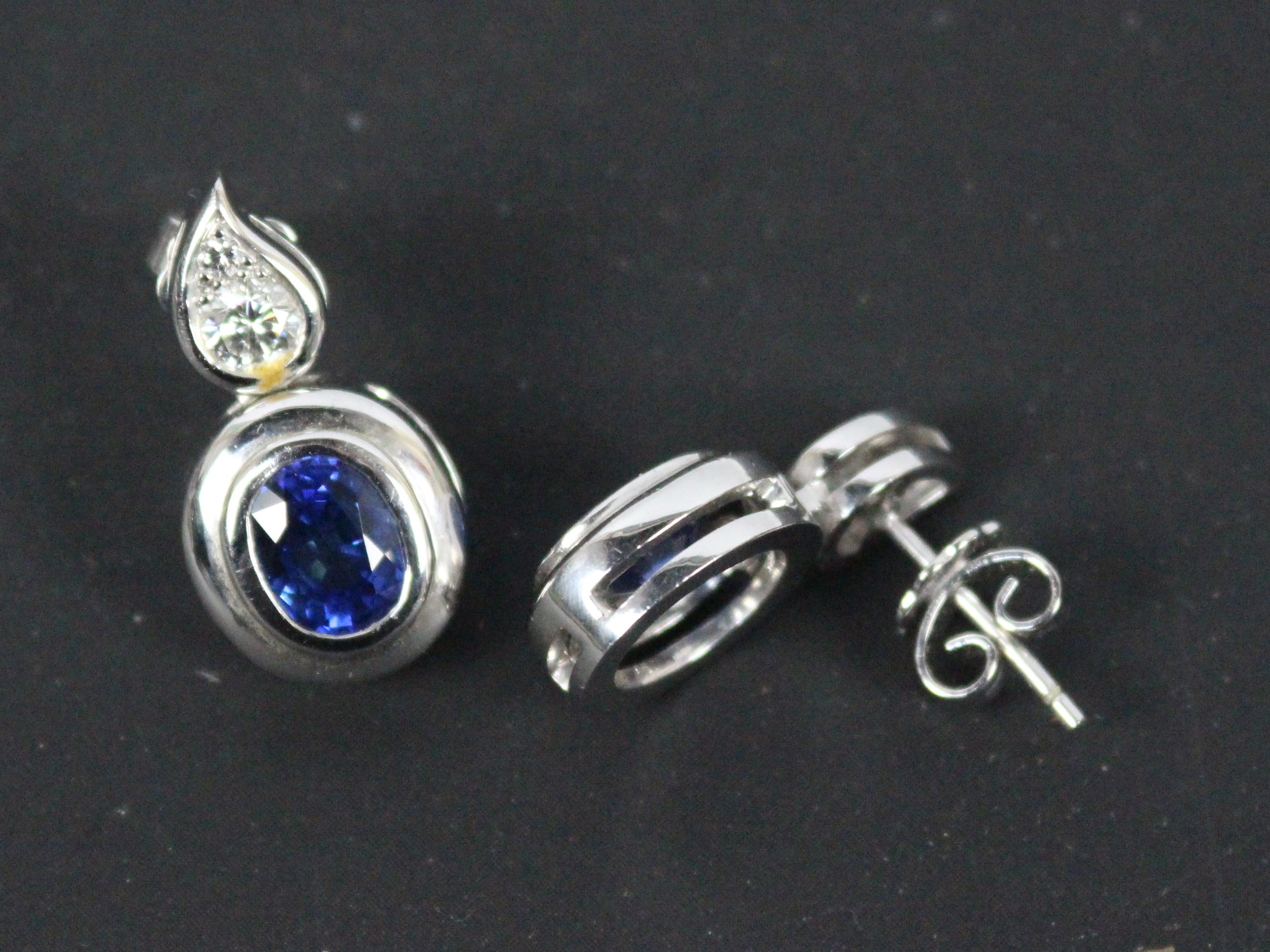 A pair of platinum, sapphire and diamond drop earrings, approximately 10.9 grams. - Image 2 of 3