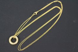 An 18ct yellow gold and diamond Roulette pendant on trace chain by Boodles (46cm length),