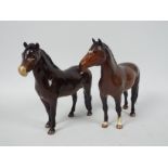 Two Beswick pony figures comprising Exmoor and New Forest, largest approximately 17 cm (h).