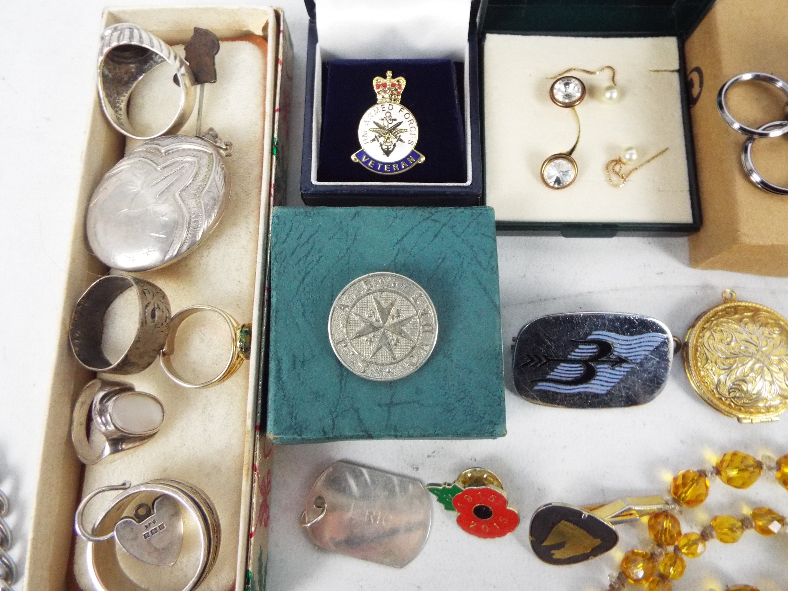 A collection of various costume jewellery with some silver / white metal to include locket, rings, - Image 5 of 9