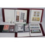 Philately - Four albums of Guernsey and Alderney mint stamps and stamp books.