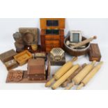 A collection of treen to include trinket boxes, rolling pins, carving and similar.