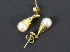 A pair of 18ct, pearl and diamond drop earrings, approximately 5.