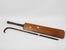 A vintage Shaw and Shrewsbury cricket bat, The George Gunn and a silver mounted, horn handled,