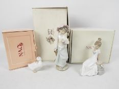Three Nao figures, two contained in original boxes, the other in associated box,