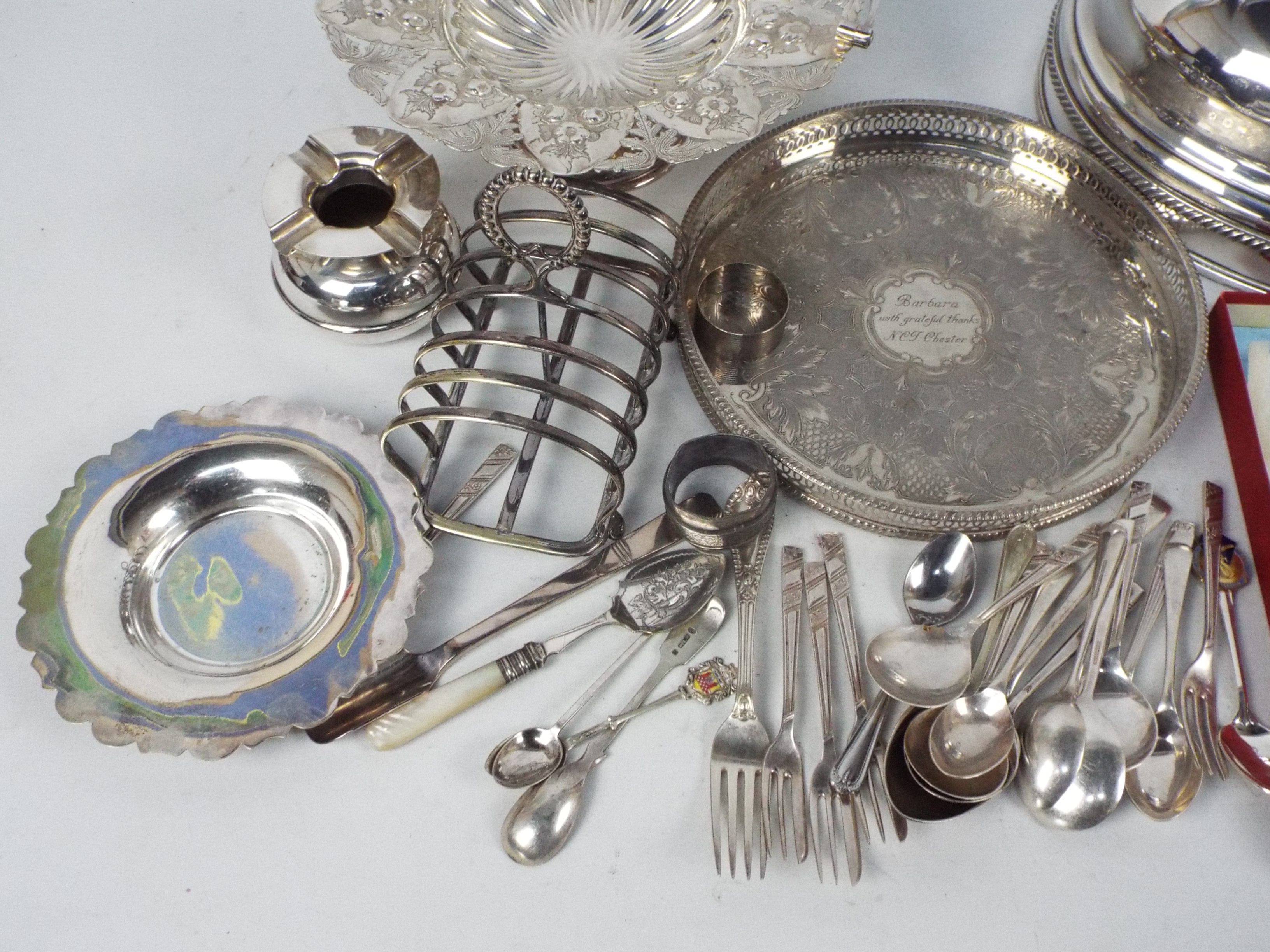 A collection of plated wares to include a cloche, tray, flatware and other. - Image 2 of 6
