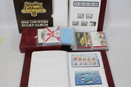 Philately - Three albums of Jersey mint stamps and stamp books.