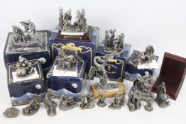 A collection of various Tudor Mint Myth And Magic figures / groups, part boxed,