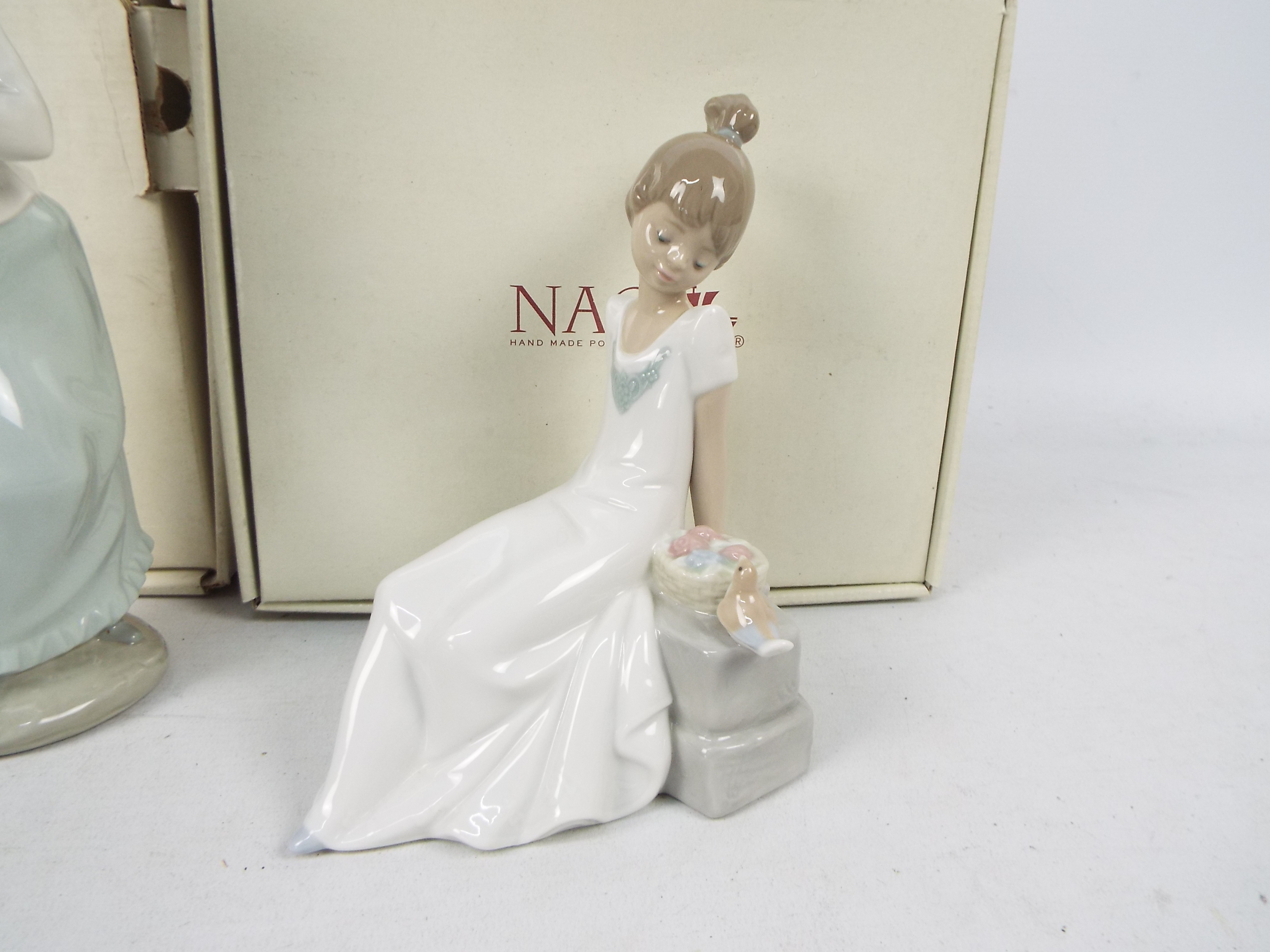 Three Nao figures, two contained in original boxes, the other in associated box, - Image 2 of 5