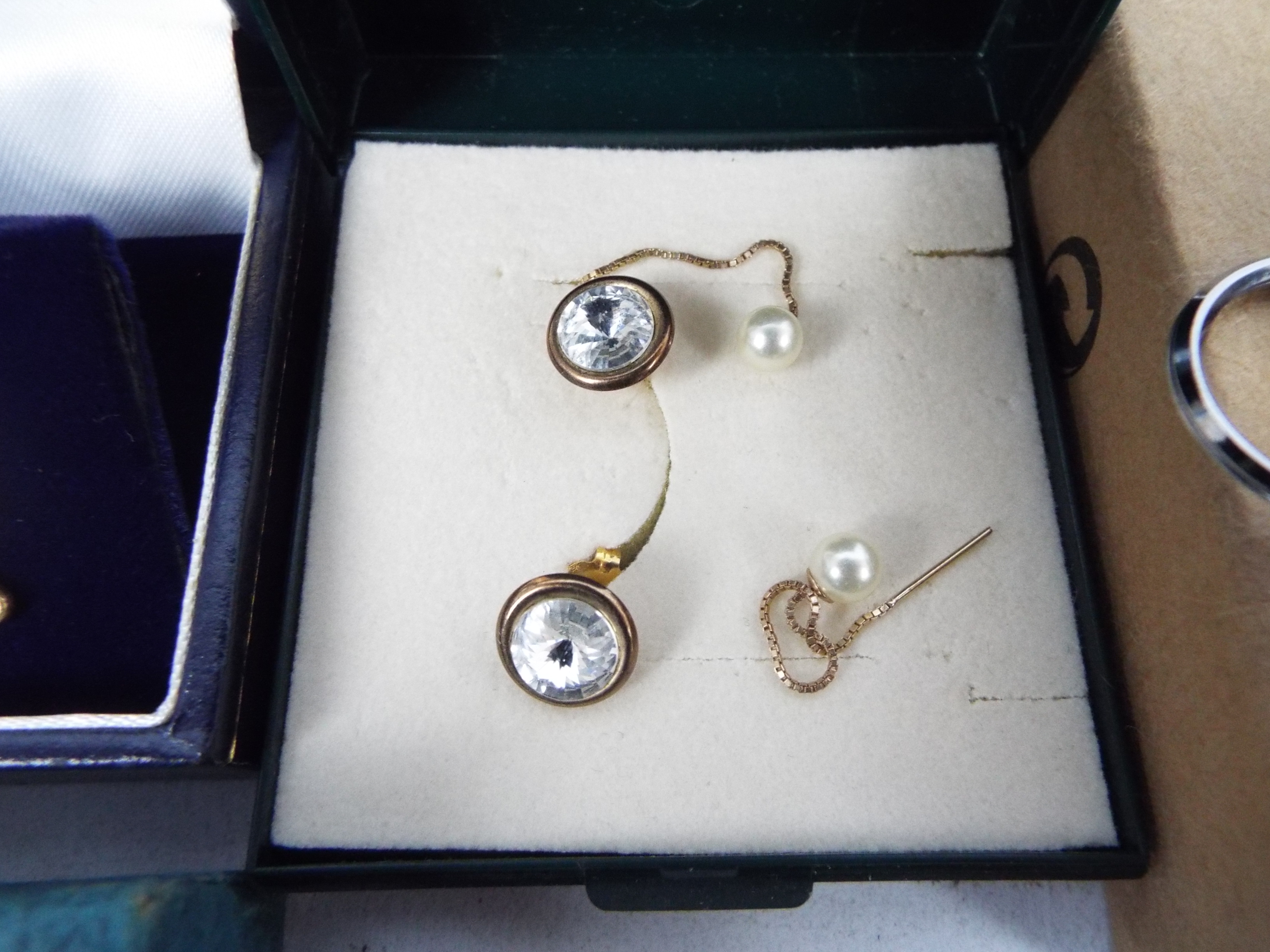 A collection of various costume jewellery with some silver / white metal to include locket, rings, - Image 6 of 9