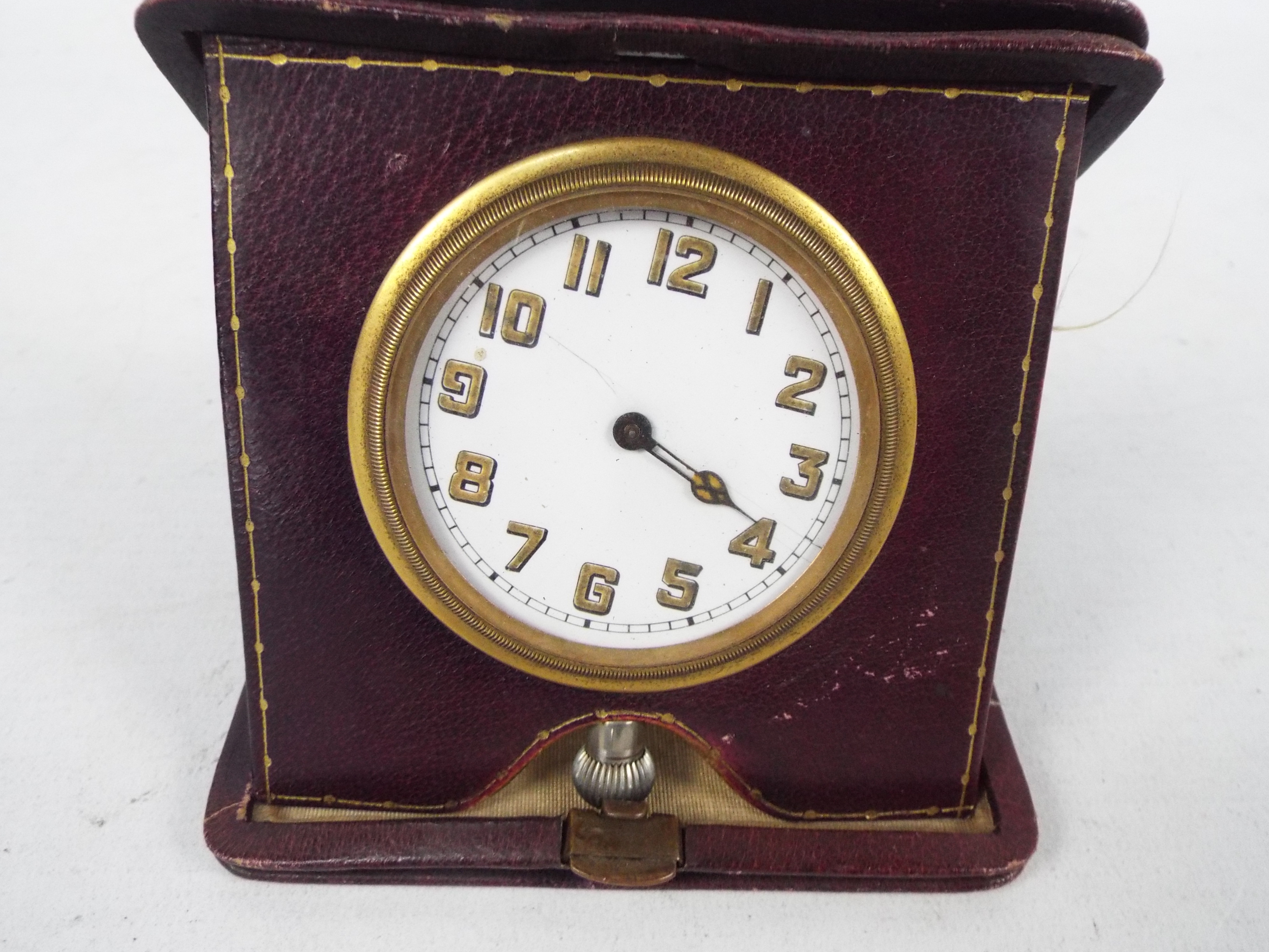 A vintage German travel clock in leather pouch, Russian pocket watch and a wrist watch. - Image 8 of 8