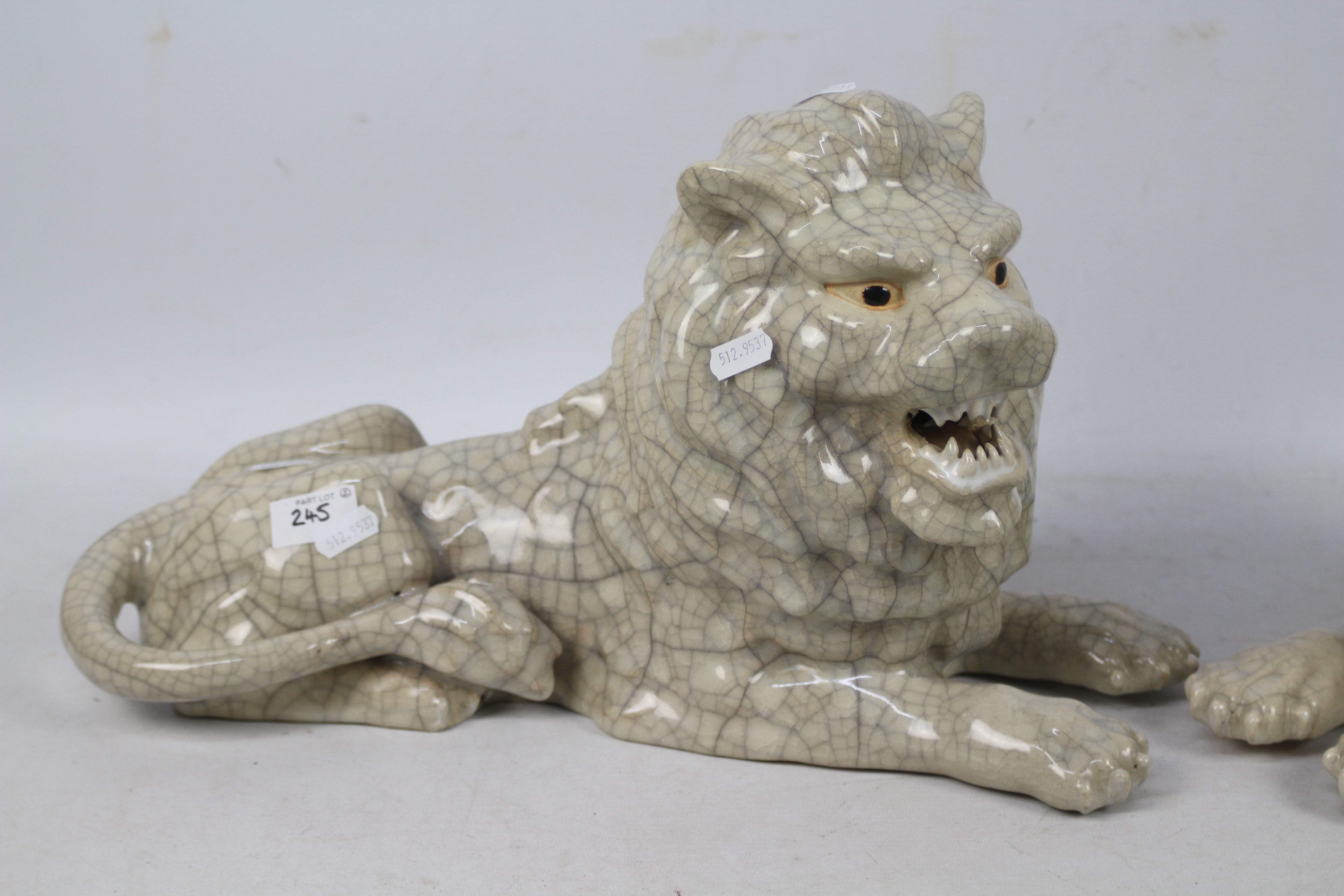 A large pair of crackle glaze lions, impressed seal mark to the base of one, - Image 2 of 8