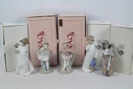 Five boxed Nao figures of children / ballerinas, largest approximately 18 cm (h).