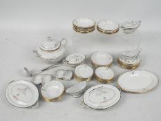 A quantity of miniature enamel tablewares, in excess of 50 pieces.