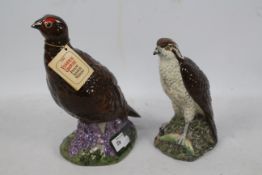 A Beswick whisky decanter for Beneagles, modelled in the form of an osprey, sealed with contents,