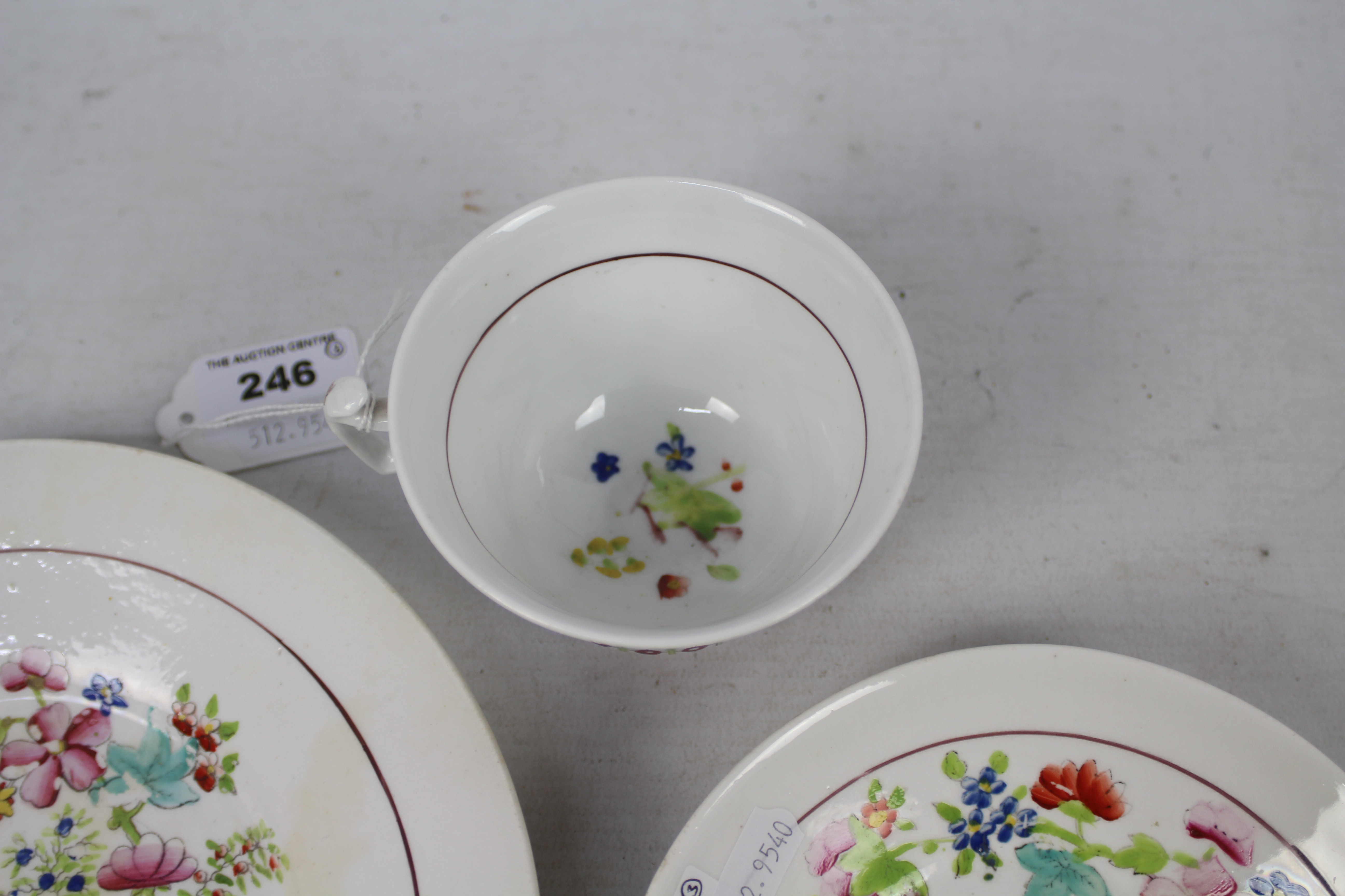 A cup, saucer and plate decorated with figures in a garden setting, unmarked to the base, - Image 5 of 6