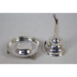 A hallmarked silver wine funnel and stand,