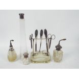 A George V, silver mounted, dressing table manicure set,