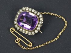 An amethyst and seed pearl brooch in unmarked yellow metal (presumed 9ct), approximately 5.