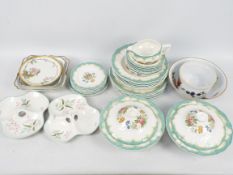 A collection of dinner wares, predominantly Royal Doulton Kingswood,