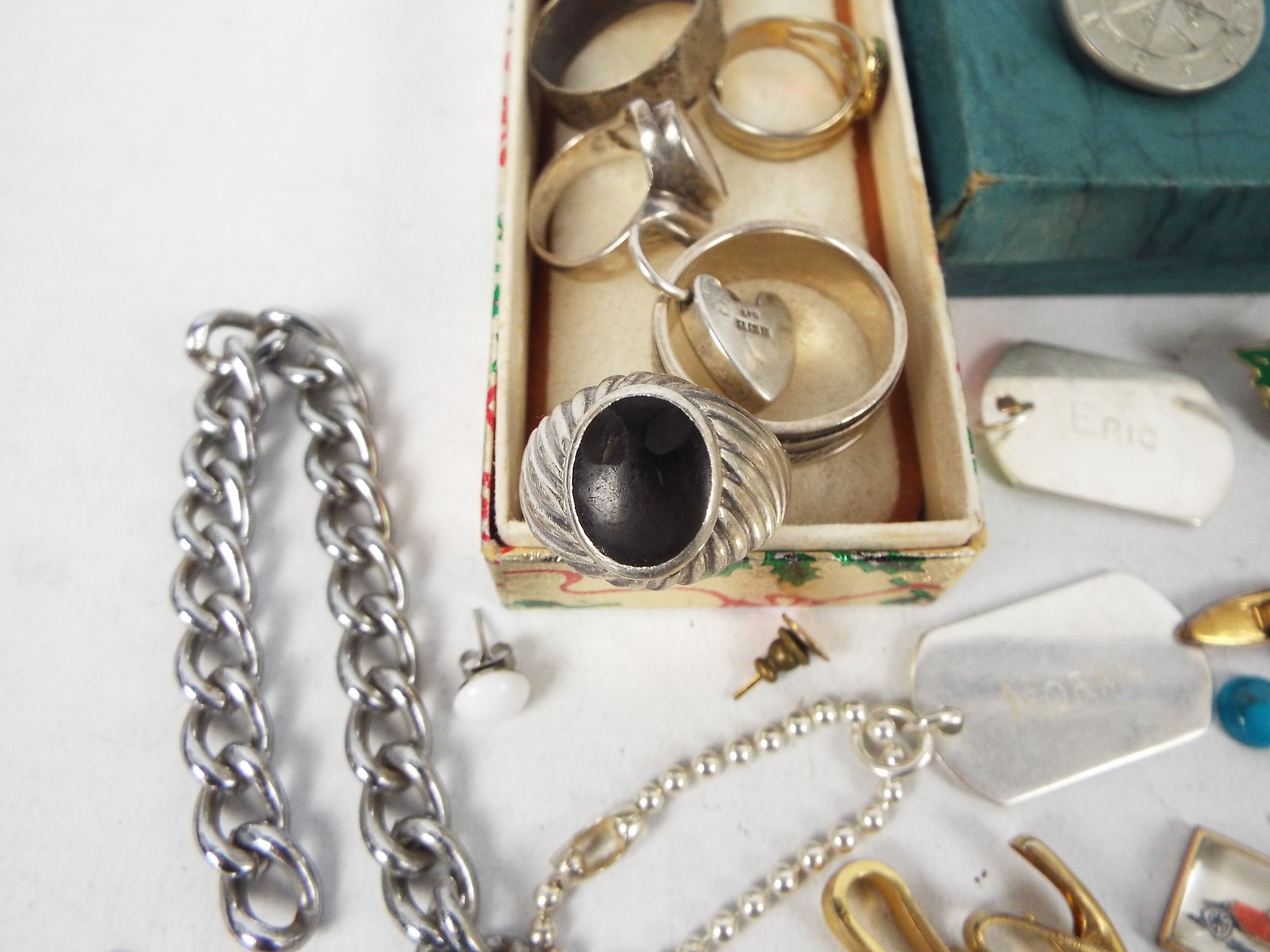 A collection of various costume jewellery with some silver / white metal to include locket, rings, - Image 9 of 9