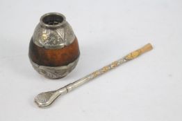 An Argentinian white and yellow metal mounted yerba mate and bombilla, stamped 800,