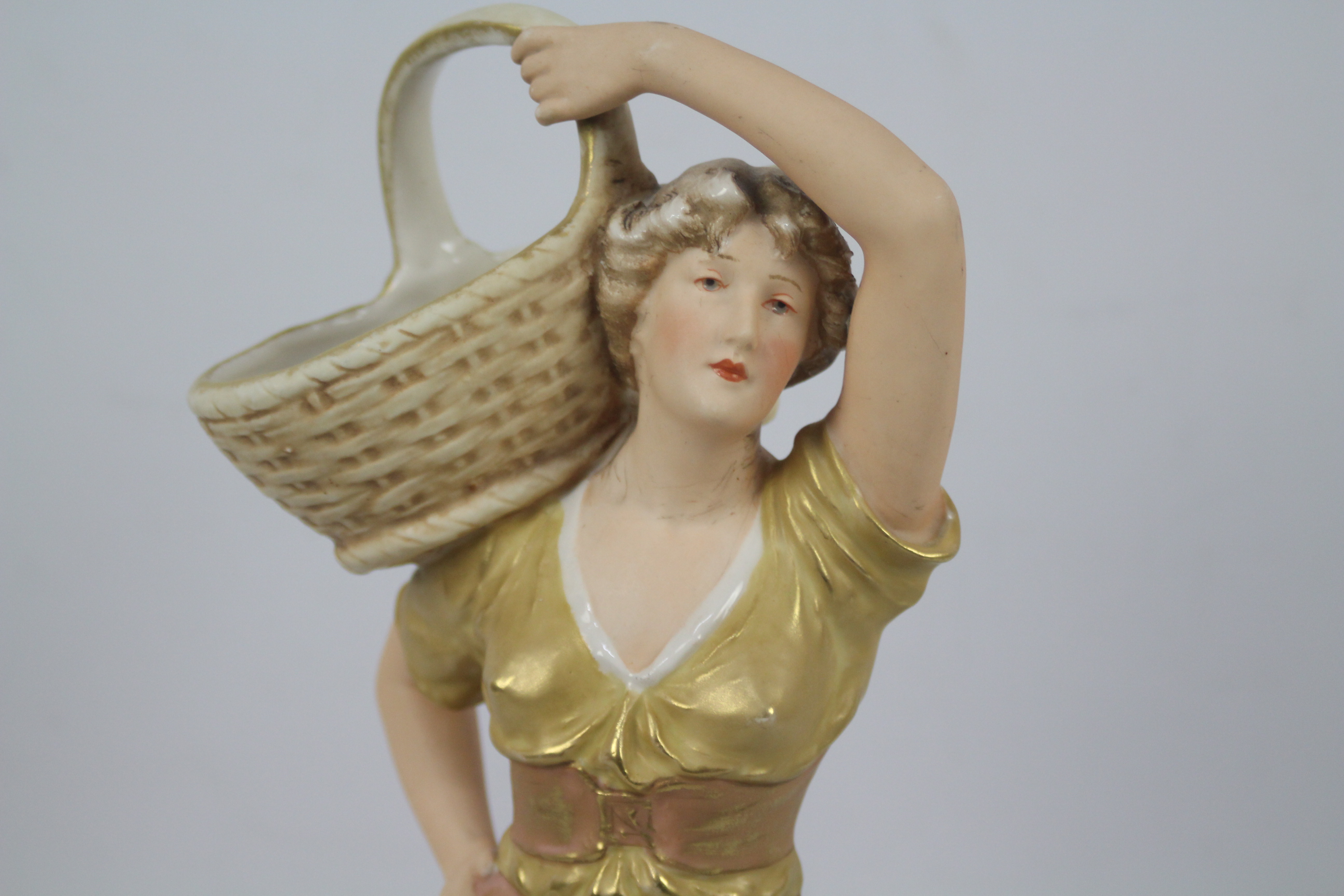 Royal Dux - A figure depicting a female carrying a basket on her shoulder, - Image 2 of 9