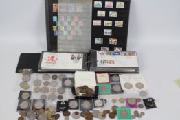 A stock book containing predominantly mint stamps, approximately £50 face value,