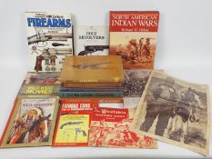 A collection of publications relating to the American wild west and firearms to include Colt