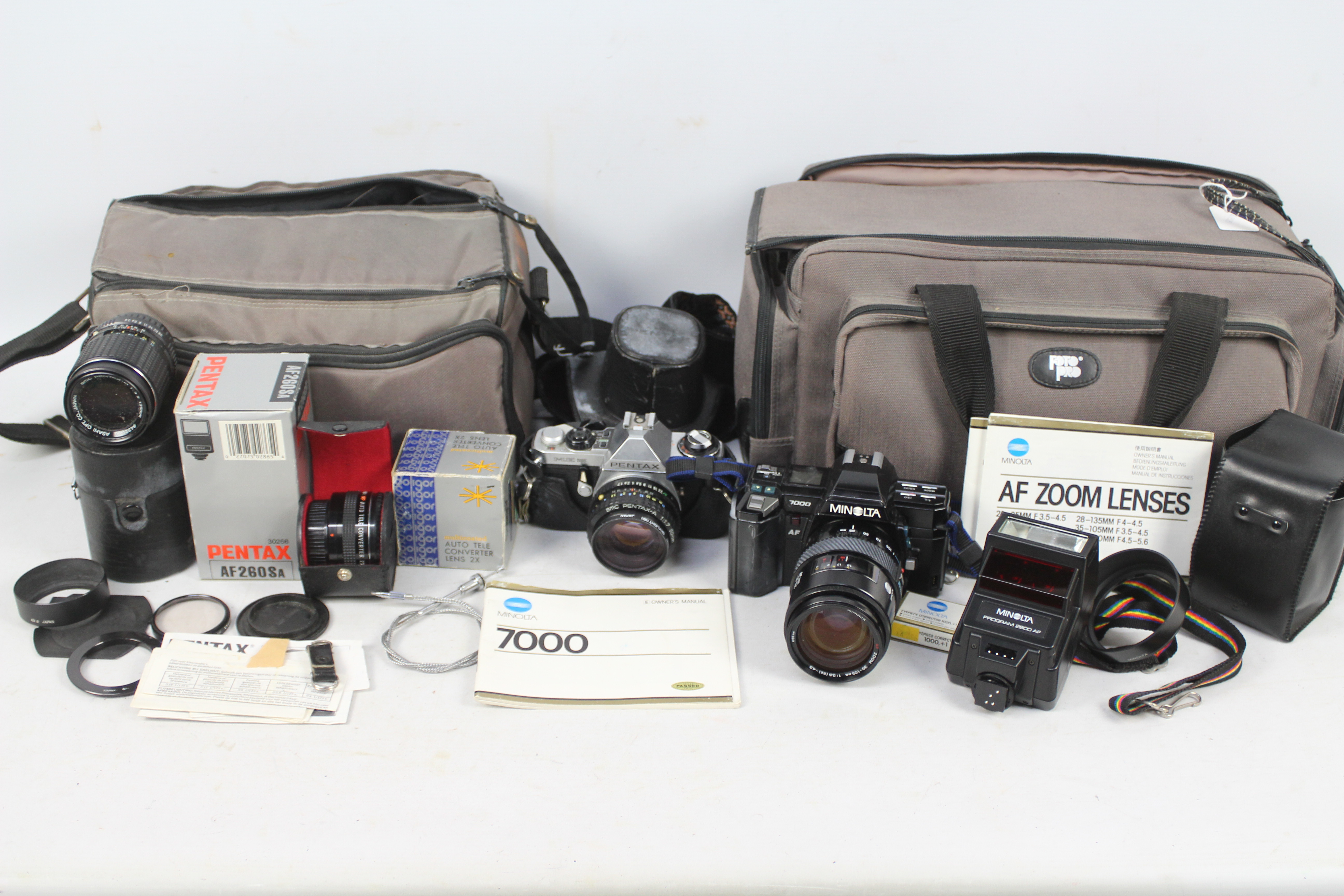 Photography - Two camera bags containing cameras and accessories to include a Pentax ME Super with