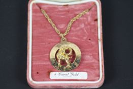 A 9ct yellow gold necklace and Zodiac pendant for Aries, chain 60 cm (l), approximately 11.7 grams.
