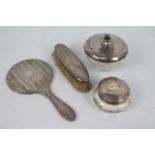 A collection of silver mounted dressing table items,