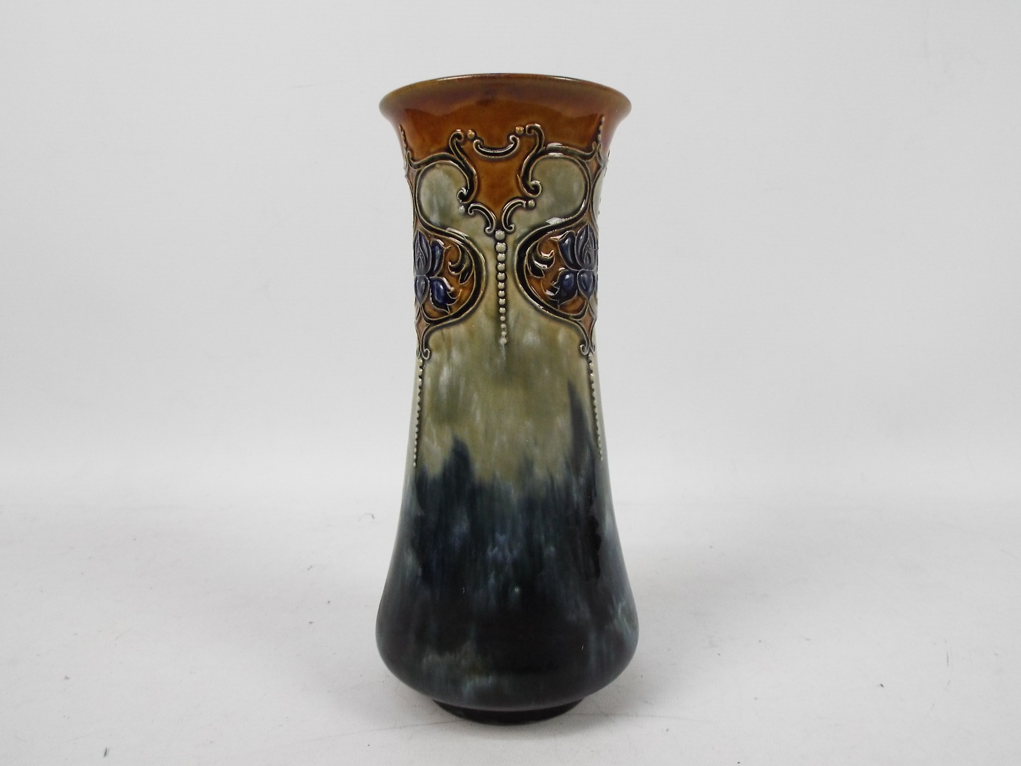 A Royal Doulton stoneware vase of tapering cylindrical form decorated with Art Nouveau flowers,
