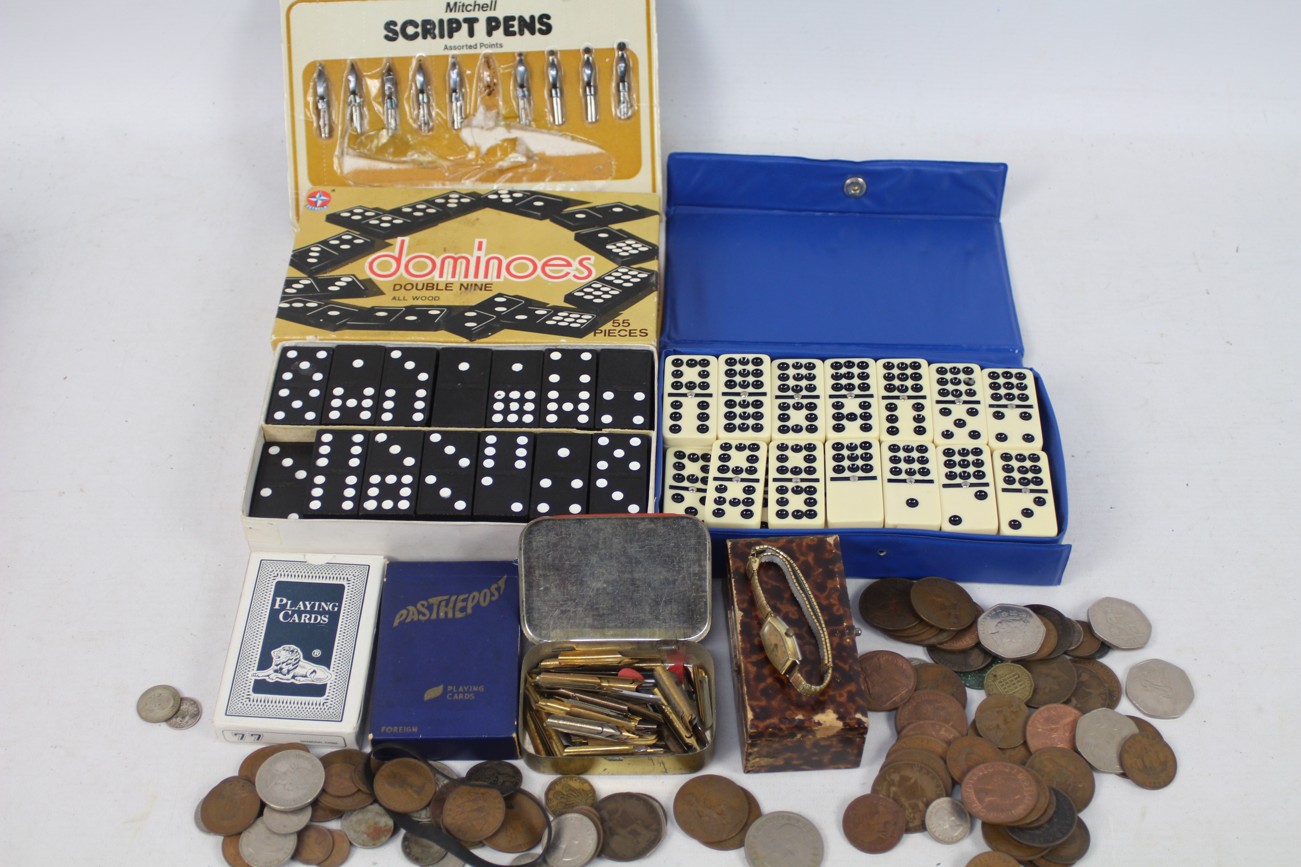 Lot to include a vintage wrist watch, two sets of double nine dominoes, playing cards, pen nibs,