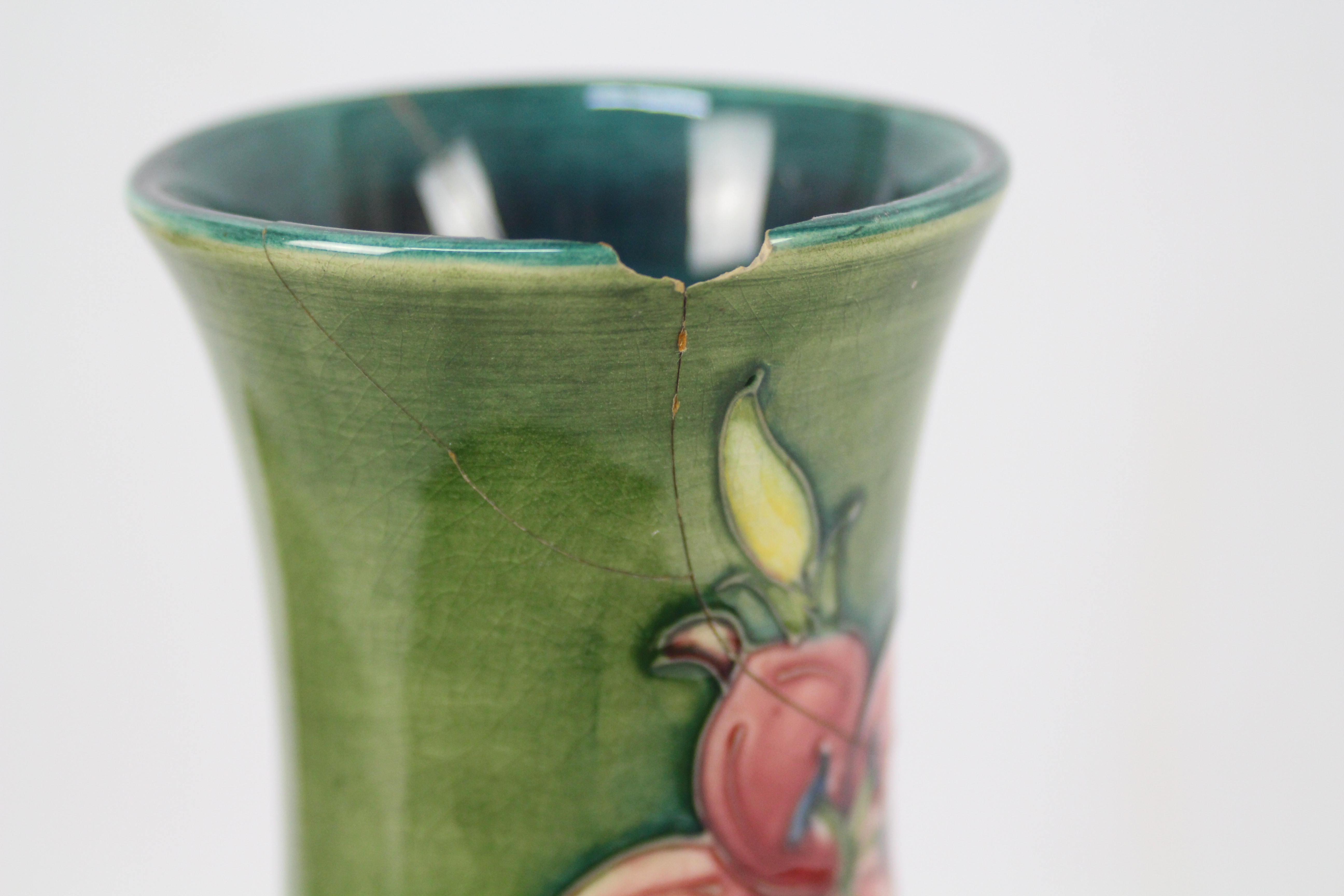 Moorcroft - A Moorcroft pottery baluster vase decorated in the Freesia pattern against a green - Image 5 of 9