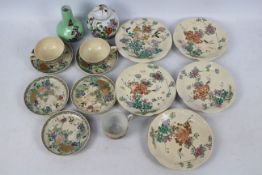 A collection of Oriental ceramics to include ginger jar, vase and other.