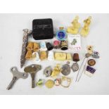 Lot to include enamel pin badges, thimbles, Japanese celluloid figures,