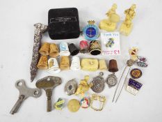 Lot to include enamel pin badges, thimbles, Japanese celluloid figures,