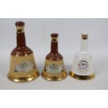 Three Wade whisky decanter for Bells, with contents, one 26⅔ fl.oz and two 50cl.